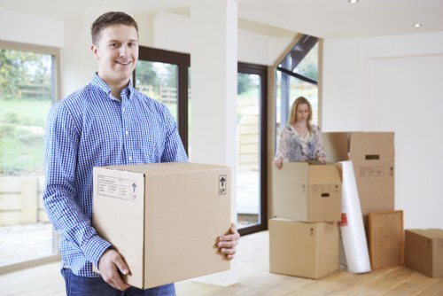 Office removals in Battersea planning with business equipment and moving boxes