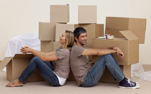 Careful loading of household furniture for a flat move in Battersea