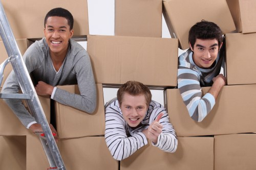 Packed household items ready for transport with a man and van team