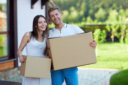 Organised house removals in Battersea with boxes and furniture loading