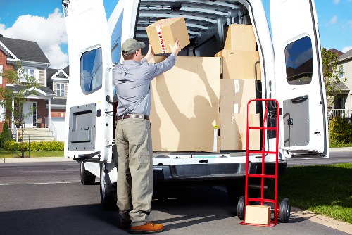 Domestic removals team handling furniture in Battersea