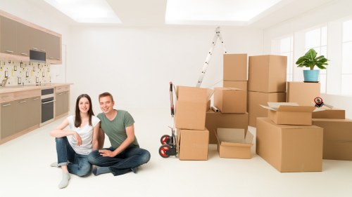 Office furniture removal service in Battersea with desks and chairs
